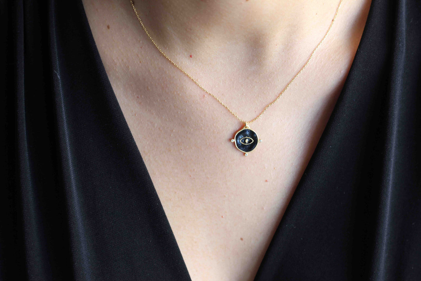 This gorgeous minimal gold evil eye necklace are made with 18k Gold Plated on solid 925 sterling silver and has 3 mini cubic zirconias around the charm. 