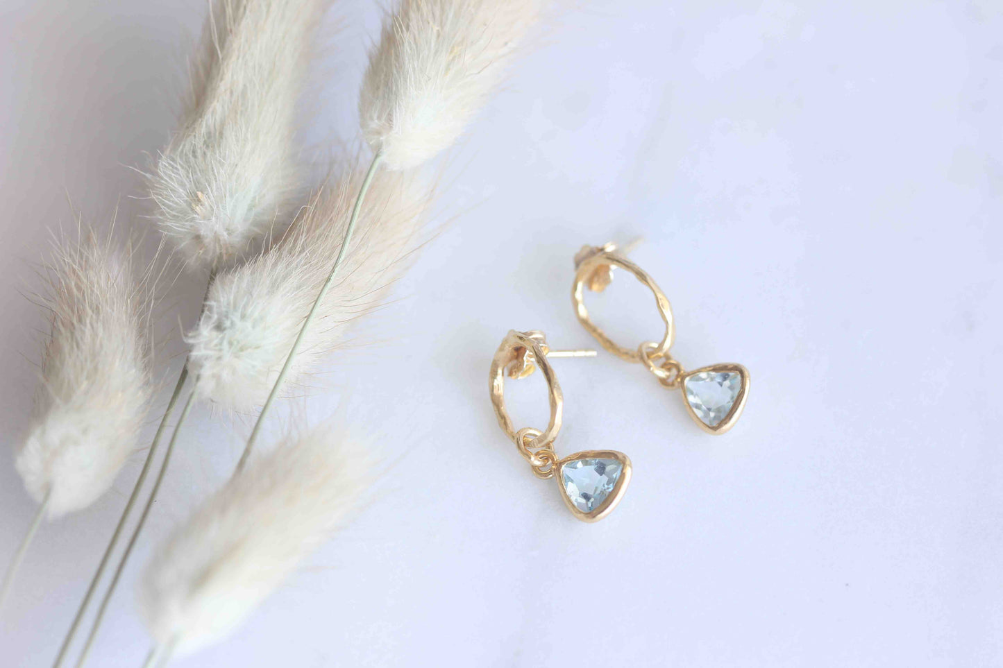 Beautiful Triangle Blue Topaz Earrings with 14k gold micro plated for long lasting on solid 925 Sterling Silver.