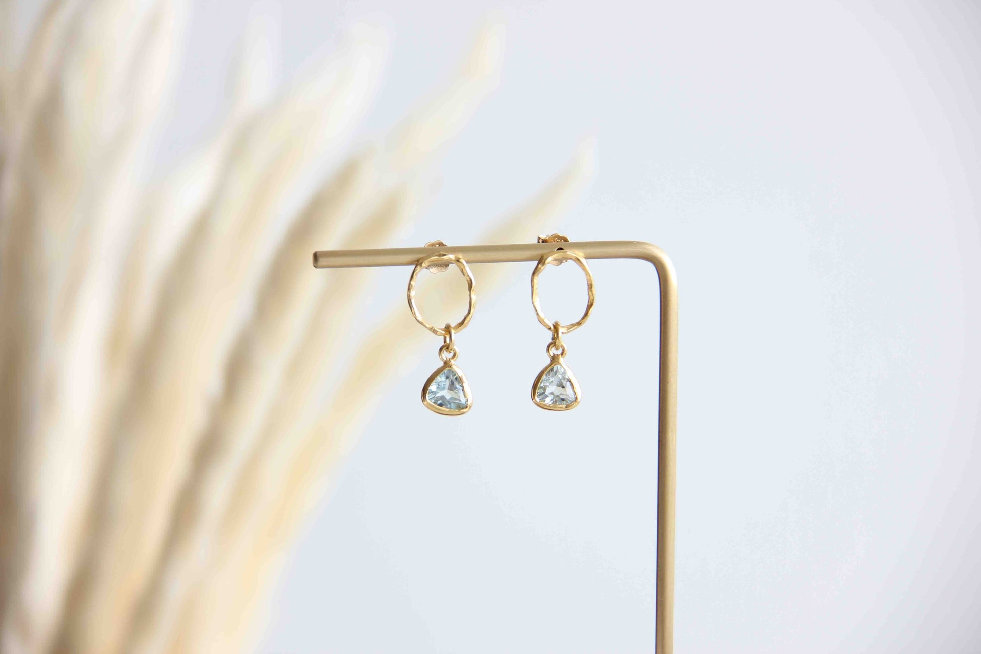 Beautiful Triangle Blue Topaz Earrings with 14k gold micro plated for long lasting on solid 925 Sterling Silver.