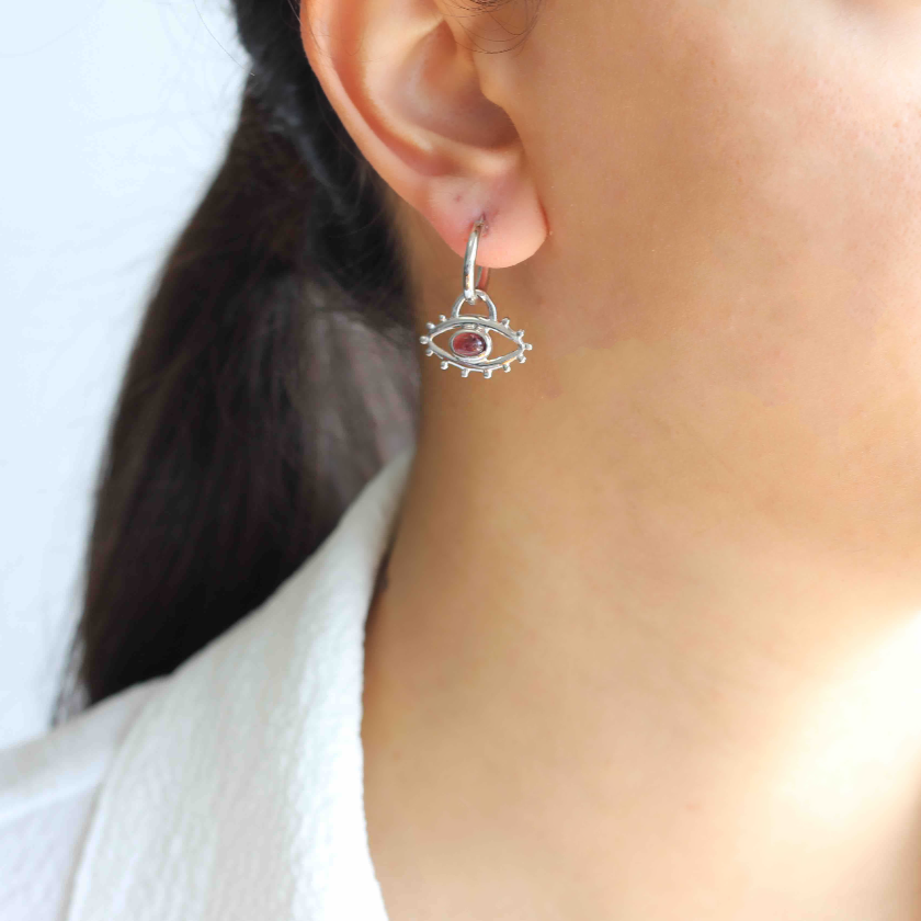 The perfect everyday earrings to wear against the "evil eyes". This gorgeous minimal silver evil eye earrings are made with natural Pink Tourmalines and solid 925 sterling silver